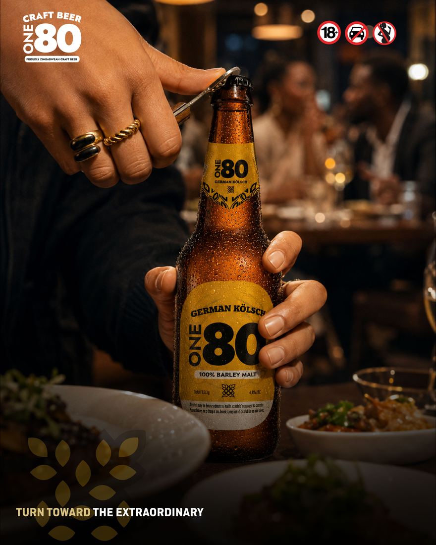 A hand opening a German Kölsh at dinner